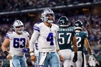 Dallas Cowboys quarterback Dak Prescott (4) celebrates after making a touchdown pass to tight end Dalton Schultz (not pictured) against the Philadelphia Eagles during the fourth quarter at AT&T Stadium in Arlington, Texas on Sept. 27, 2021.