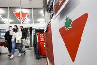 People shop at the Liberty Village Canadian Tire location in Toronto, on Thursday, February 17, 2022. Christopher Katsarov/The Globe and Mail)