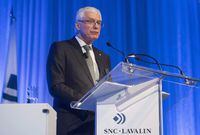 USE TWO COLUMN ONLY - SNC-Lavalin Chairman Kevin Lynch addresses shareholders during the company's annual general meeting in Montreal, Thursday, May 3, 2018. SNC-Lavalin Goup Inc. says Kevin Lynch plans to step down as chair of the board of directors once a successor has been chosen by the board after the company's annual meeting this week. THE CANADIAN PRESS/Graham Hughes