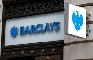 FILE PHOTO: A view shows signage on a branch of Barclays Bank in London, Britain, March 17, 2023. REUTERS/Peter Nicholls/File Photo