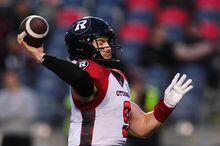 Ottawa Redblacks quarterback Nick Arbuckle (9) throws a pass against the Montreal Alouettes during first half CFL pre-season football action in Ottawa on Friday, May 26, 2023. THE CANADIAN PRESS/Sean Kilpatrick