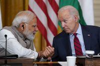 President Joe Biden speaks with India's Prime Minister Narendra Modi during a meeting with American and Indian business leaders in the East Room of the White House, Friday, June 23, 2023, in Washington. (AP Photo/Evan Vucci)