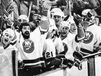 FEBRUARY 20, 1982 -- UNIONDALE, NY -- Clark Gillies, second from left, and other New York Islanders celebrate goal. John Tonelli scored with less than a minute to play to give the Islanders a 3-2 victory Feb. 20, 1982. Islanders set a NHL record with fifteen straight victories.  Credit: Jack Balletti / UPI