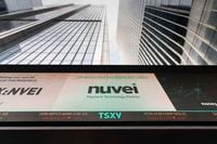 A sign displaying a Nuvei logo is seen at the Toronto Stock Exchange in Toronto, Thursday, November 5, 2020.