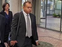 FILE - Ramesh "Sunny" Balwani, right, the former lover and business partner of Theranos CEO Elizabeth Holmes, walks into federal court in San Jose, Calif., June 24, 2022. A federal judge on Monday, Nov. 7, granted a three-week delay in the sentencing of Balwani to give probation officers more time to recommend his punishment for engineering a scam tied to Theranos’ blood-testing technology. (AP Photo/Michael Liedtke, File)