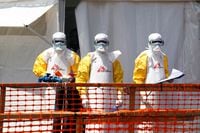 Health workers in protective suits at the newly constructed MSF Ebola treatment centre, in Goma, Democratic Republic of Congo, on Aug. 4, 2019.