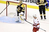 Carolina Hurricanes defenceman Dougie Hamilton celebrates after scoring a goal as Boston Bruins goalie Tuukka Rask reacts during the third period in Game Two of the Eastern Conference First Round during the 2020 NHL Stanley Cup Playoffs at Scotiabank Arena in Toronto on Aug. 13, 2020.