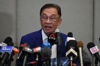 Malaysian opposition leader Anwar Ibrahim holds a news conference in Kuala Lumpur, on Oct. 13, 2020.