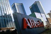 FILE PHOTO: The logo of Alibaba Group is seen at its office in Beijing, China January 5, 2021. REUTERS/Thomas Peter