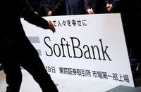 FILE PHOTO: SoftBank Corp. placard is prepared during a ceremony to mark the company's debut on the Tokyo Stock Exchange in Tokyo, Japan December 19, 2018.   REUTERS/Issei Kato