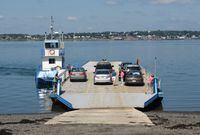 Passengers board a car ferry for the short trip from Campobello Island, N.B., to nearby Deer Island, in an Aug 1, 2009, file photo.