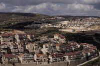 FILE - A general view shows the West Bank Jewish Jewish settlement of Efrat, Thursday, March 10, 2022. Israel's coalition is gearing up for a major test of its viability with an expected vote on the legal status of Jewish settlers in the West Bank that could break apart the fragile union if the motion falls. (AP Photo/Maya Alleruzzo, File)