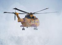 A Royal Canadian Air Force Cormorant helicopter from 103 Search and Rescue Squadron based at 9 Wing Gander takes off from the airport in Deer Lake, N.L. on Tuesday, Dec. 1, 2015. A Canadian rescue ship and aircraft are involved in the search for a Spanish fishing vessel that sank off Newfoundland with the loss of at least four crew members. THE CANADIAN PRESS/Andrew Vaughan