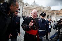 FILE PHOTO: Cardinal Marc Ouellet of Canada walks through Saint Peter's Square as he leaves at the end of a meeting in the Synod Hall at the Vatican March 11, 2013.  REUTERS/Tony Gentile/File Photo