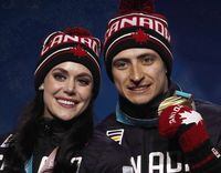Ice dance gold medallists Tessa Virtue and Scott Moir, of Canada, pose during their medals ceremony at the 2018 Winter Olympics in Pyeongchang, South Korea, Tuesday, Feb. 20, 2018. Virtue and Moir knew they were taking a huge risk when they came out of a two-year retirement, setting their lofty sights on a gold medal at the 2018 Pyeongchang Olympics. THE CANADIAN PRESS/AP-Charlie Riedel