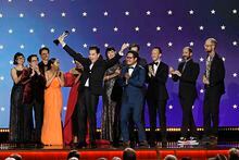 LOS ANGELES, CALIFORNIA - JANUARY 15: (L-R) Shirley Kurata, Ke Huy Quan, Harry Shum Jr., Stephanie Hsu, Jonathan Wang, Michelle Yeoh, Jonathan Wang, Kelsi Ephraim, Daniel Kwan, Jon Read, Jason Kisvarday, and Daniel Scheinert accept the Best Picture award for "Everything Everywhere All at Once" onstage during the 28th Annual Critics Choice Awards  at Fairmont Century Plaza on January 15, 2023 in Los Angeles, California. (Photo by Kevin Winter/Getty Images for Critics Choice Association)