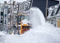 A snowblower widens the roadway in St. John’s on Sunday, Jan. 19, 2020.
