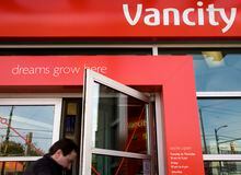A customer enters a Vancity bank May 12, 2007 in Vancouver, B.C.   Rafal Gerszak for the Globe and Mail