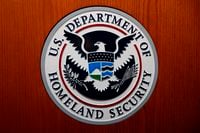 In this June 28, 2019, file photo the Department of Homeland Security seal is seen during a news conference in Washington.