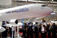 FILE PHOTO: A model of Airbus A350-1000 jetliner is displayed at the China International Aviation and Aerospace Exhibition, or Airshow China, in Zhuhai, Guangdong province, China September 28, 2021. REUTERS/Aly Song/File Photo