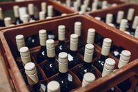 Stack of wine bottles in cellar