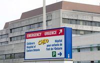 A sign directing visitors to the emergency department is shown at the Childrens Hospital of Eastern Ontario, Friday, May 15, 2015 in Ottawa. The large Ottawa children’s hospital says it’s contending with “unprecedented demand” as it reports a surge in cases of a common respiratory virus.THE CANADIAN PRESS/Adrian Wyld