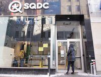A person walks into an SQDC store in Montreal, Saturday, January 15, 2022. Quebec's cannabis subsidiary says its growth has plateaued for the first time despite the number of pot shops in the province increasing. THE CANADIAN PRESS/Graham Hughes