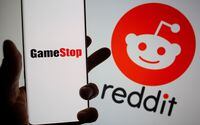 GameStop logo is seen in front of displayed Reddit logo in this illustration taken on Febr. 2, 2021.