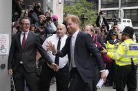 Prince Harry arrives at the High Court in London, Wednesday, June 7, 2023. Prince Harry has given evidence from the witness box and has sworn to tell the truth in testimony against a tabloid publisher he accuses of phone hacking and other unlawful snooping. He alleges that journalists at the Daily Mirror and its sister papers used unlawful techniques on an "industrial scale" to get scoops. Publisher Mirror Group Newspapers is contesting the claims. (AP Photo/Frank Augstein)