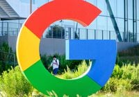 In this file photo taken on June 27, 2022, a worker walks along a path at Googles Bay View campus in Mountain View, California.