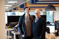 Dave Wilkin (left), Founder of Ten Thousand Coffees, and John Stockhouse, Chief People Officer of Dentsu Aegis Network Canada, are photographed in Dentsu Aegis Network's Toronto office. (Della Rollins for the Globe and Mail)