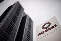 A Rogers Communications Inc. logo is shown outside the Rogers Building in Toronto on Tuesday, April 22, 2014. Rogers Communications Inc. reported a second-quarter profit of $538 million, up from $528 million a year ago. THE CANADIAN PRESS/Darren Calabrese