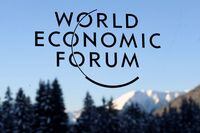 (FILES) In this file photo taken on January 19, 2017, a sign and logo of the World Economic Forum is seen on the third day of the Forum's annual meeting in Davos. - The World Economic Forum (WEF) said on December 20, 2021, it "will defer its annual meeting in Davos... in the light of continued uncertainty over the Omicron" variant of coronavirus. The high-powered meeting, which usually draws leading figures from business, politics and diplomacy, will instead be held in "early summer", the organisers said. Last year's edition was cancelled because of the pandemic. (Photo by FABRICE COFFRINI / AFP) (Photo by FABRICE COFFRINI/AFP via Getty Images)