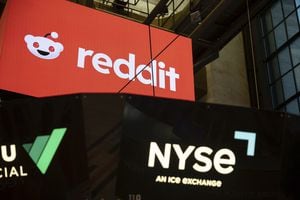 FILE - Reddit Inc. signage is seen on the New York Stock Exchange trading floor prior to Reddit IPO, March. 21, 2024. Reddit and Trump Media are the first social media companies to begin trading publicly in the last five years. They're also, thanks to the rabid reception among investors, the latest meme stocks. (AP Photo/Yuki Iwamura, File)
