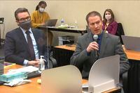 In this image from video, defense attorney Eric Nelson, left, and former Minneapolis police officer Derek Chauvin address Hennepin County Judge Peter Cahill during motions before the court, on April 15, 2021.