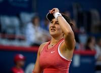Aug 12, 2021; Montreal, Quebec, Canada; Bianca Andreescu of Canada reacts after losing a point against Ons Jabeur of Tunisia (not pictured) during third round play at Stade IGA. Mandatory Credit: Eric Bolte-USA TODAY Sports