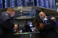 Traders work on the floor of the New York Stock Exchange (NYSE) on Sept. 7.