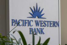 LOS ANGELES, CALIFORNIA - MAY 4: A Pacific Western Bank sign is seen on May 4, 2023 in Los Angeles, California. Pacific Western Bank's stock plunged Thursday in the wake of other bank failures. Following an unusual outflow of deposits this week, PacWest Bancorp says it plans to sell a $2.7 billion loan portfolio. (Photo by David McNew/Getty Images)