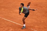 ROME, ITALY - MAY 11: Felix Auger-Aliassime of Canada serves  during his singles match against Diego Schwartzman of Argentina during day 4 of the Internazionali BNL d’Italia at Foro Italico on May 11, 2021 in Rome, Italy. (Photo by Clive Brunskill/Getty Images)