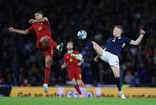 Soccer Football - UEFA Euro 2024 Qualifiers - Group A - Scotland v Spain - Hampden Park, Glasgow, Scotland, Britain - March 28, 2023 Spain's Rodri in action with Scotland's Scott McTominay REUTERS/Russell Cheyne