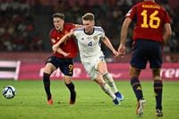 Spain's midfielder #09 Gavi vies with Scotland's midfielder #04 Scott McTominay during the EURO 2024 first round group A qualifying football match between Spain and Scotland at the La Cartuja stadium in Seville on October 12, 2023. (Photo by JAVIER SORIANO / AFP) (Photo by JAVIER SORIANO/AFP via Getty Images)