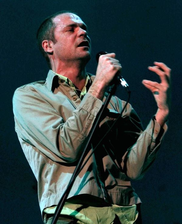 Tragically Hip lead singer Gord Downey performs during their sold-out concert at the Air Canada Centre in Toronto Monday, February 22, 1999. The band is currently on a cross Canada tour. (CP PHOTO) 1999 (stf-Kevin Frayer)