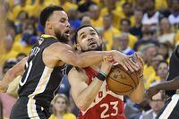 Toronto Raptors guard Fred VanVleet (23) is fouled by Golden State Warriors guard Stephen Curry (30) during second half basketball action in Game 6 of the NBA Finals in Oakland, Calif., on Thursday, June 13, 2019. Anthony (Doc) Cornell recalls a game where Fred VanVleet got hit in the eye so hard it swelled shut "like Rocky." Cornell, who was coaching the teenaged VanVleet on his PrymeTime AAU team, insisting on staying in the game, crushing his opponents "with one eye." THE CANADIAN PRESS/Frank Gunn