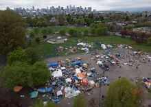 Tents and other structures are seen in an aerial view at a homeless encampment in Vancouver, B.C., on Friday, April 30, 2021. The City of Prince George, B.C., has apologized for the harm it caused to vulnerable people when it removed their structures from a homeless camp.THE CANADIAN PRESS/Darryl Dyck