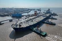 FILE PHOTO: An aerial view shows a crude oil tanker at an oil terminal off Waidiao island in Zhoushan, Zhejiang province, China January 4, 2023. China Daily via REUTERS