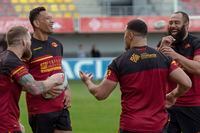 Australia's Israel Folau, second from left, is seen with teammates during a training session in Perpignan, southern France, on Feb. 11, 2020.