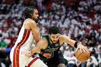 MIAMI, FLORIDA - MAY 25: Gabe Vincent #2 of the Miami Heat defends Jayson Tatum #0 of the Boston Celtics during the fourth quarter in Game Five of the 2022 NBA Playoffs Eastern Conference Finals at FTX Arena on May 25, 2022 in Miami, Florida. NOTE TO USER: User expressly acknowledges and agrees that, by downloading and or using this photograph, User is consenting to the terms and conditions of the Getty Images License Agreement. (Photo by Andy Lyons/Getty Images)