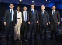 Candidates Patrick Brown, left, Leslyn Lewis, Scott Aitchison, Pierre Poilievre, Jean Charest and Roman Baber, pose for photos after the French-language Conservative Leadership debate Wednesday, May 25, 2022, in Laval, Que. THE CANADIAN PRESS/Ryan Remiorz