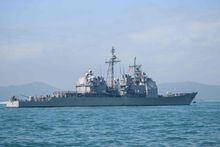 (FILES) In this file photo taken on November 21, 2018, the US Navy's USS Chancellorsville, guided missile destroyer,  in Hong Kong. - China on November 30, 2018, scolded the US for sending naval vessels close to disputed islands in the South China Sea where Beijing has built military installations. According to the Pentagon, the  Chancellorsville sailed November 26  near the Paracel Islands, known as Xisha in Chinese. (Photo by ANTHONY WALLACE / AFP)ANTHONY WALLACE/AFP/Getty Images