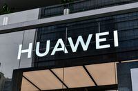 (FILES) This file photo taken on May 31, 2021 shows a Huawei logo at the flagship store in Shenzhen, in China's southern Guangdong province. - China on May 20, 2022 hit out at Ottawa for blocking Chinese telecommunications giants Huawei and ZTE from Canadian 5G networks, saying the ban was "groundless" and based on spurious security risks. (Photo by AFP) / China OUT (Photo by STR/AFP via Getty Images)